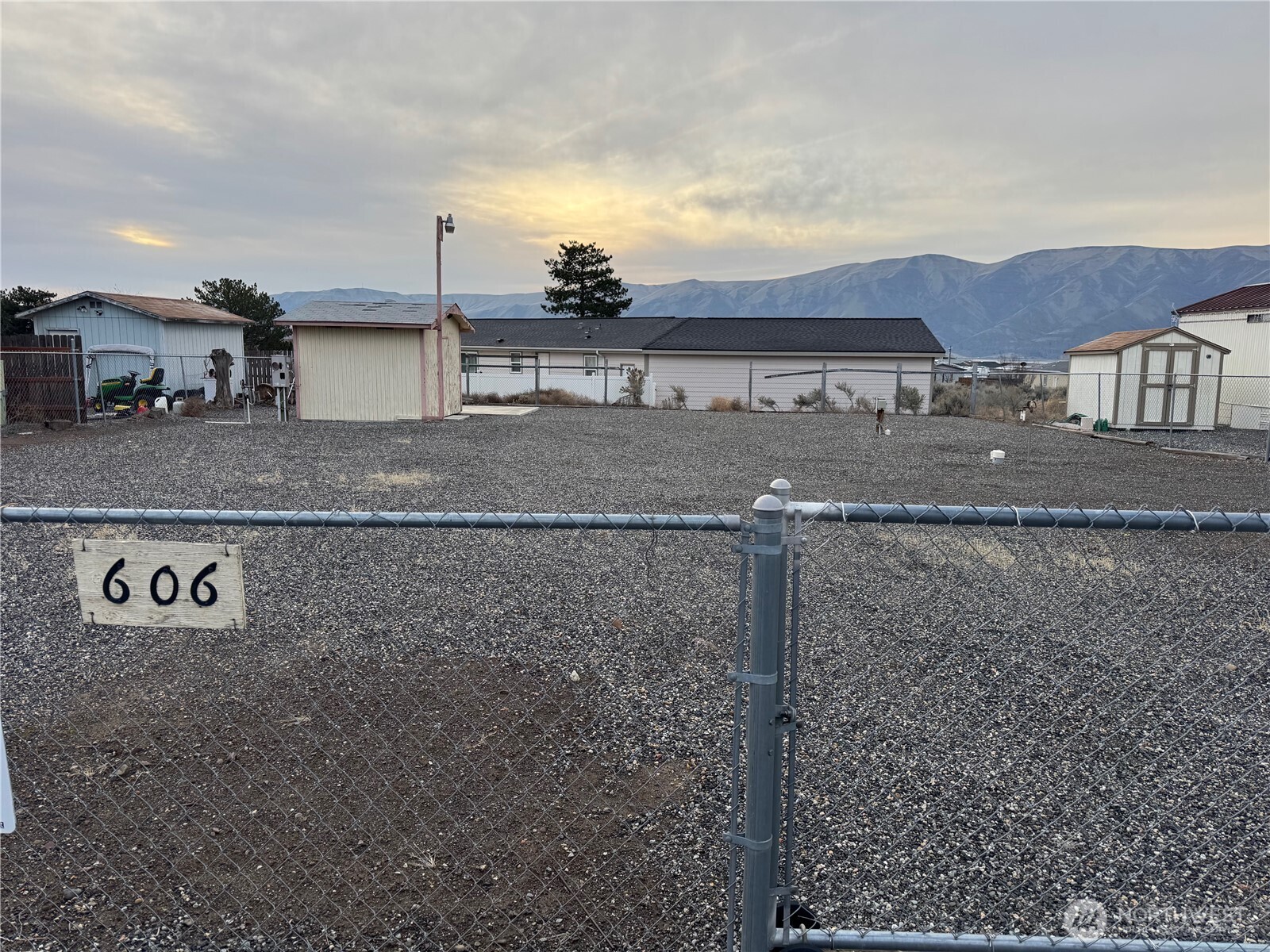 a view of a house with a back yard
