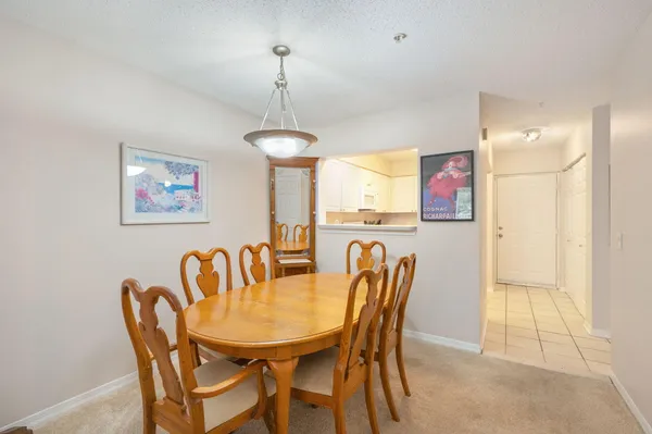 a view of a dining room with furniture