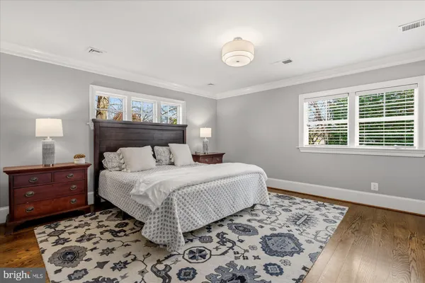 a view of a room with furniture and a window