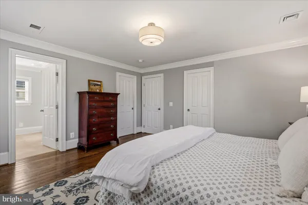 a bathroom with a sink double vanity and a mirror
