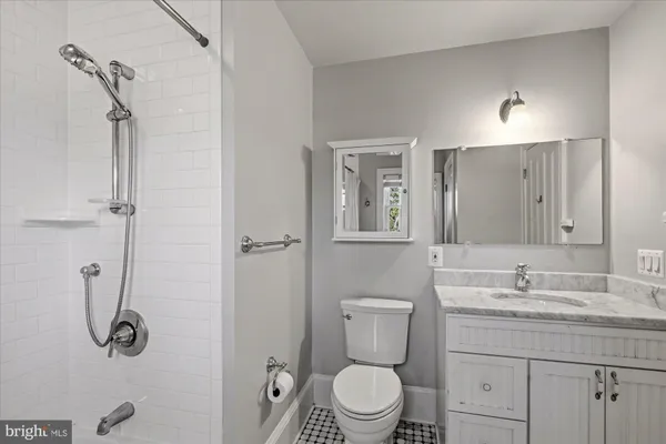 a view of patio with table and chairs and potted plants