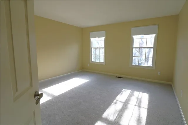 a view of a room with a hallway