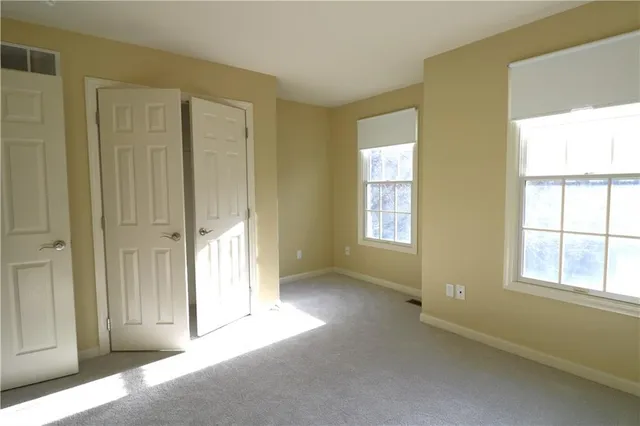 an empty room with windows