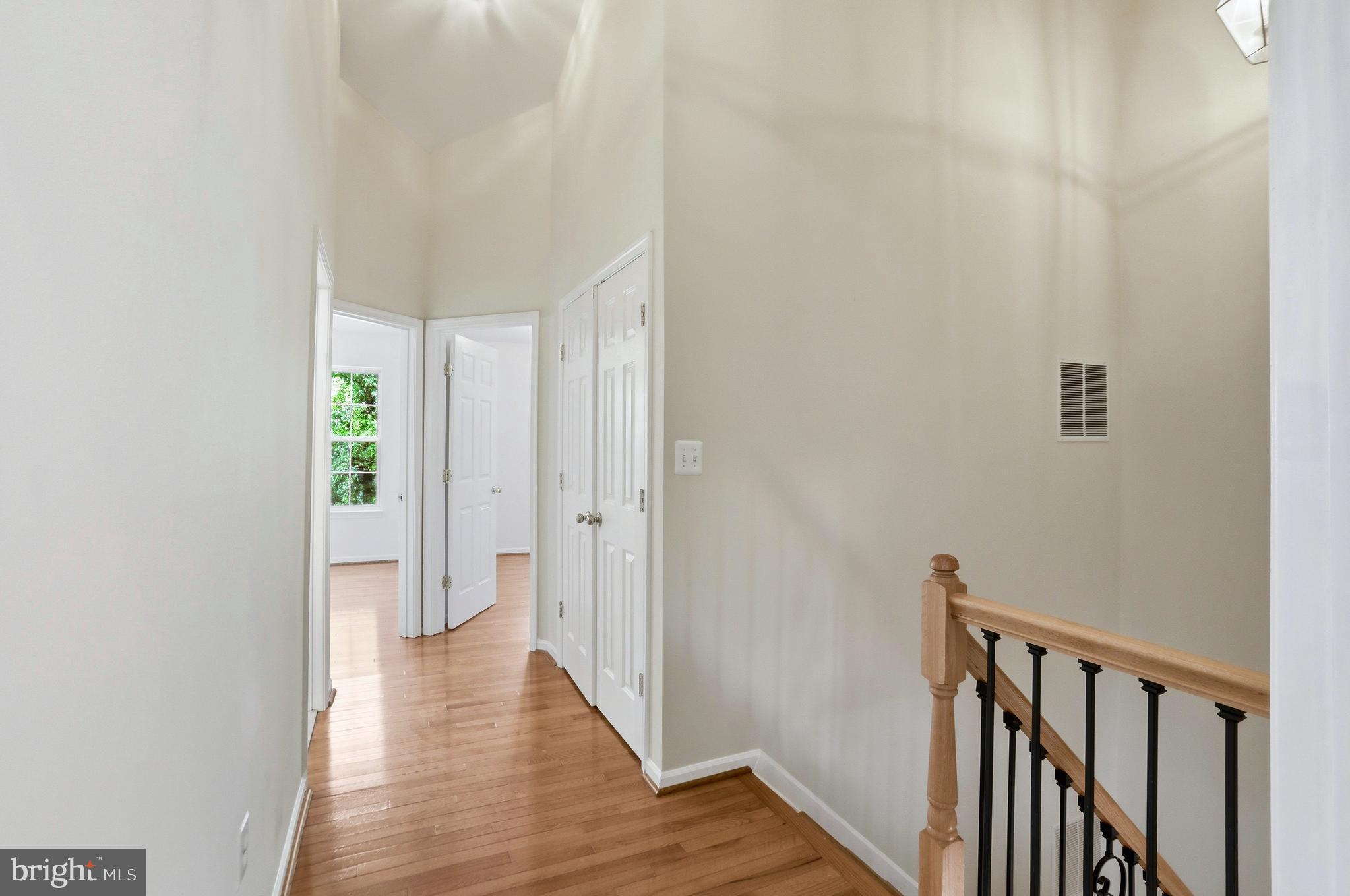 21648 Frame Square Broadlands, VA 20148 - Photo 16 of 36 a view of a hallway with wooden floor