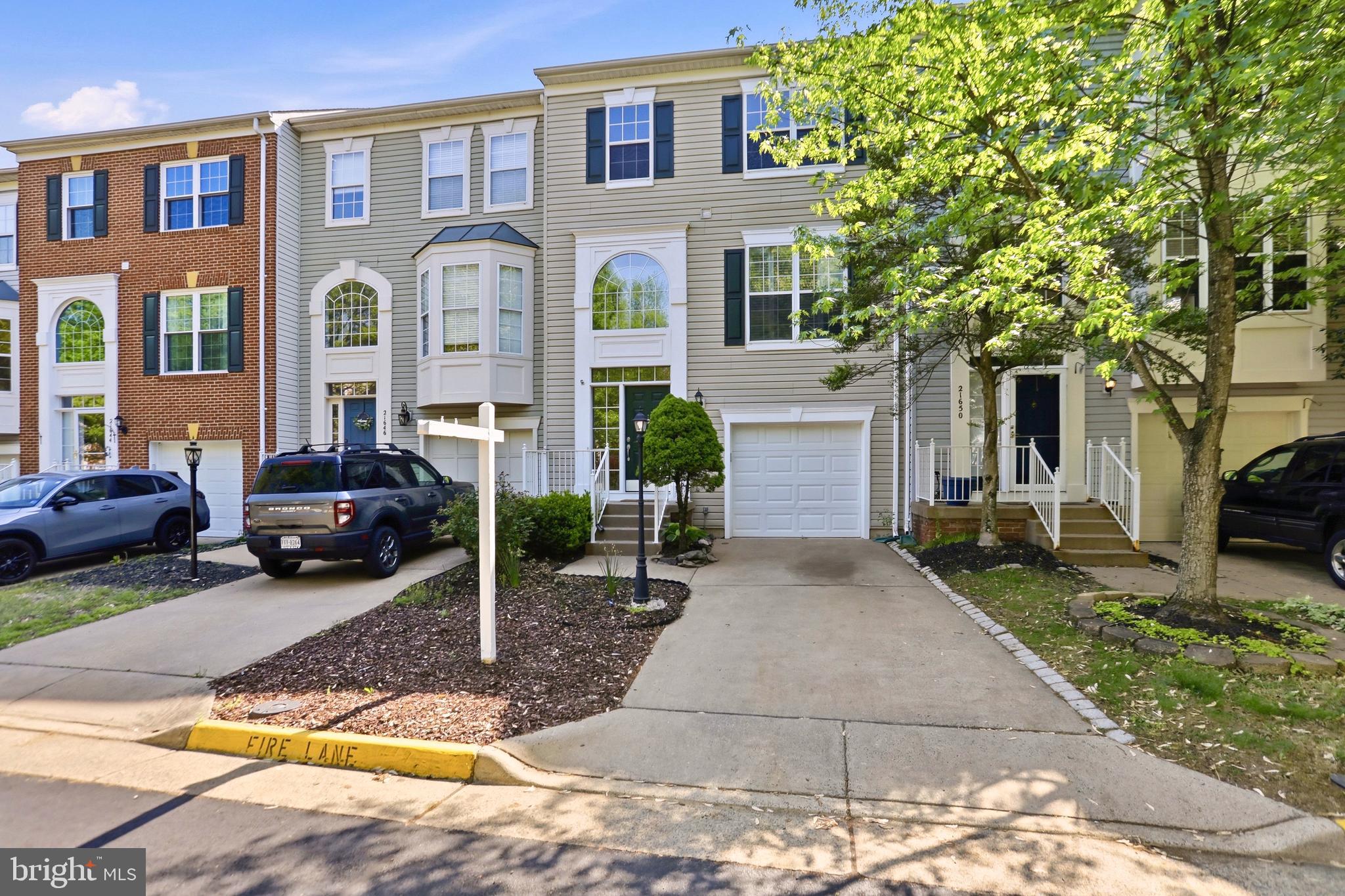 21648 Frame Square Broadlands, VA 20148 - Photo 2 of 36 a front view of a house with entertaining space