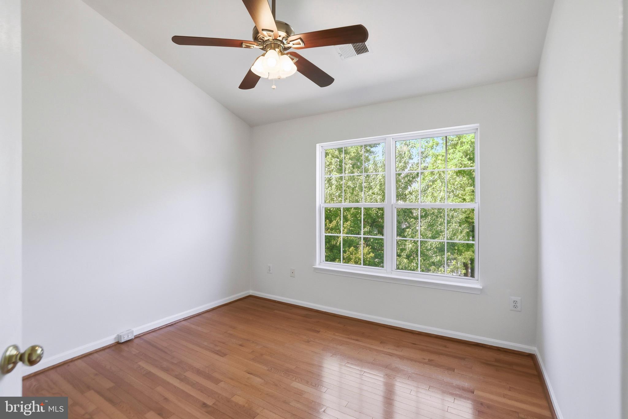 21648 Frame Square Broadlands, VA 20148 - Photo 23 of 36 an empty room with a window and a fan