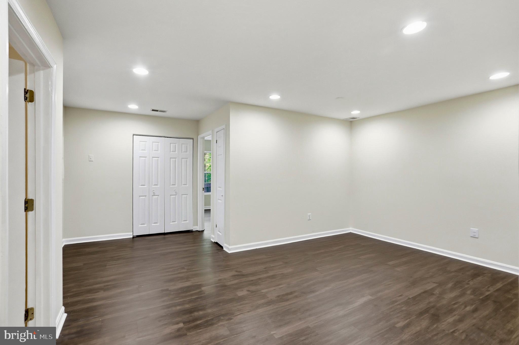 21648 Frame Square Broadlands, VA 20148 - Photo 26 of 36 a view of an empty room with wooden floor