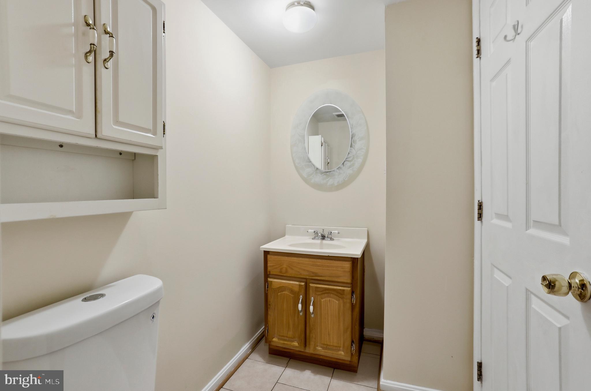 21648 Frame Square Broadlands, VA 20148 - Photo 28 of 36 a bathroom with a toilet and a sink
