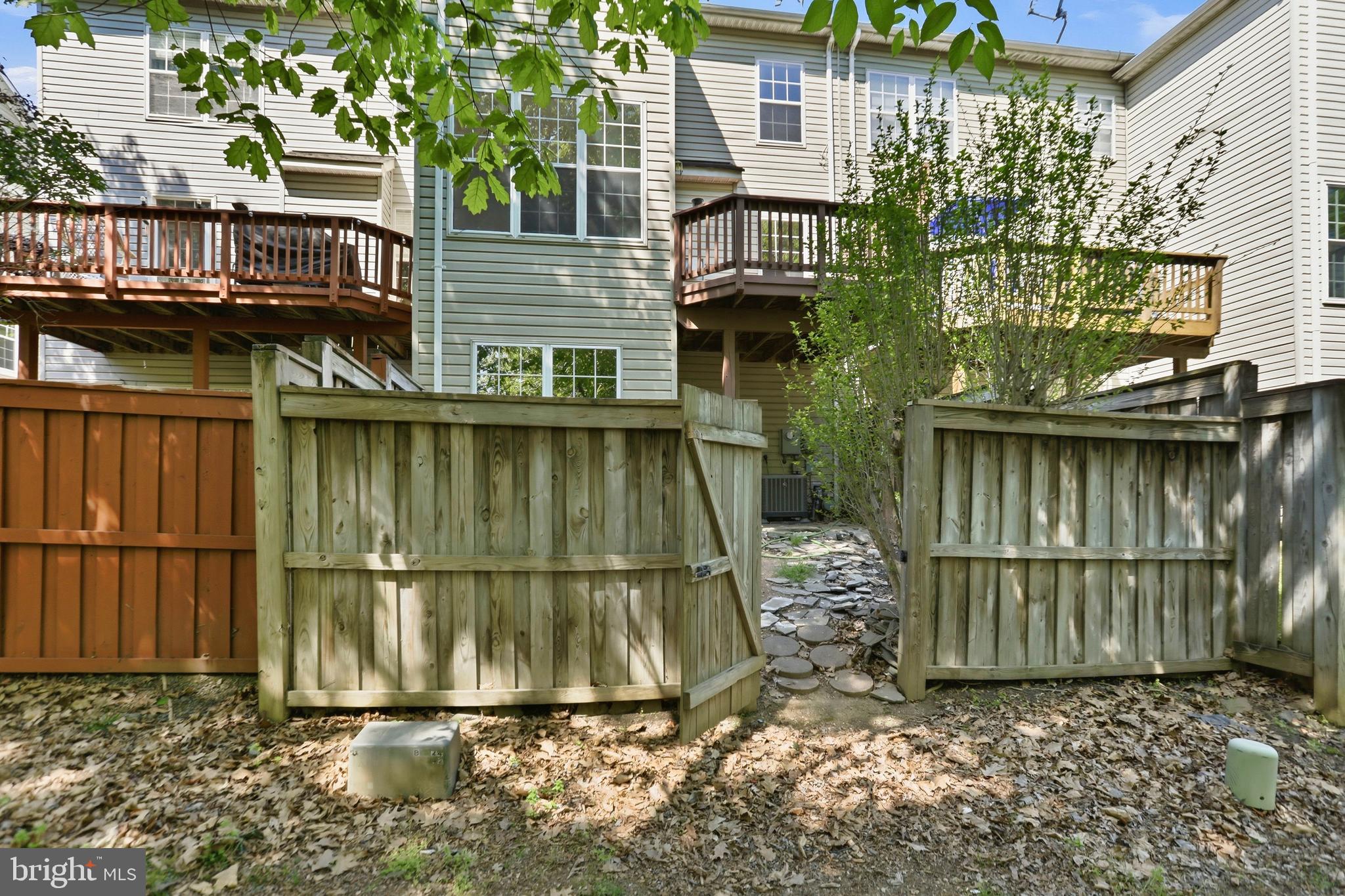 21648 Frame Square Broadlands, VA 20148 - Photo 33 of 36 a view of a small house with a yard
