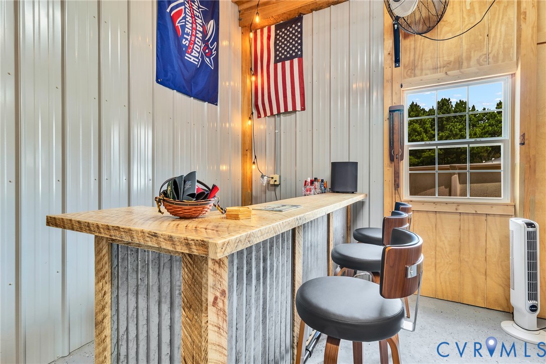 184 Crosshills Road Heathsville, VA 22473 - Photo 23 of 44 Custom bar area featuring a wood-finish countertop