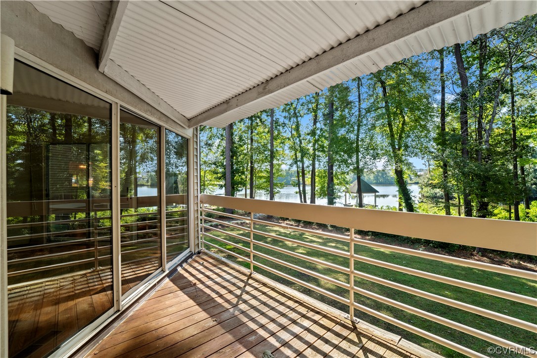 126 Water Pointe Court Midlothian, VA 23112 - Photo 12 of 19 a view of a balcony with floor to ceiling windows with wooden floor