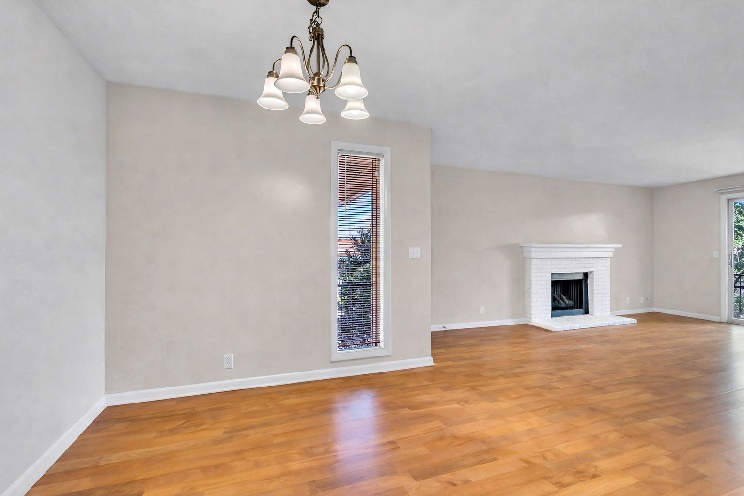 2116 Hobbs Road, Unit N19 Nashville, TN 37215 - Photo 11 of 33 a view of a livingroom with a fireplace and chandelier fan