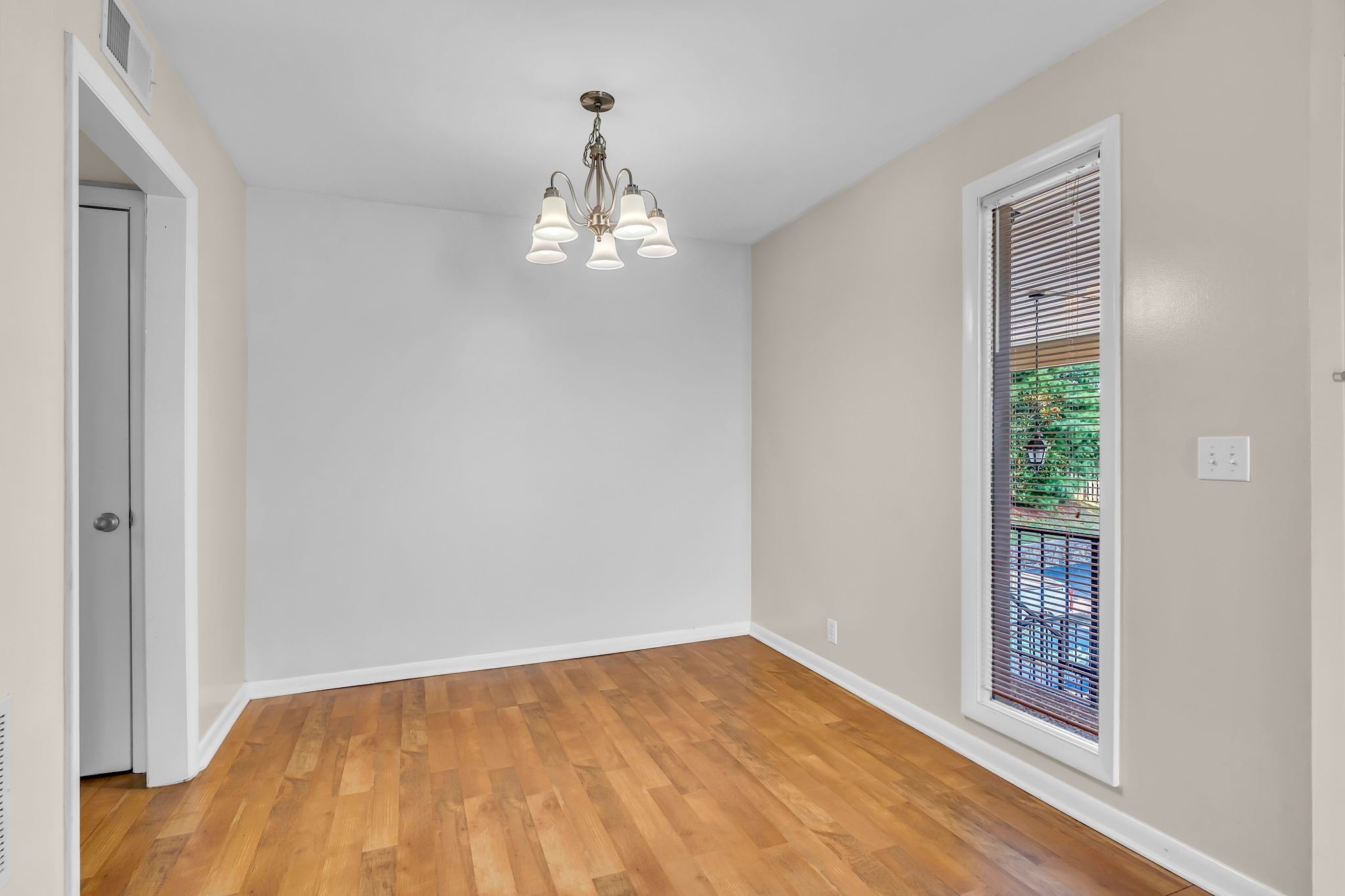 2116 Hobbs Road, Unit N19 Nashville, TN 37215 - Photo 13 of 33 a view of empty room with wooden floor and fan