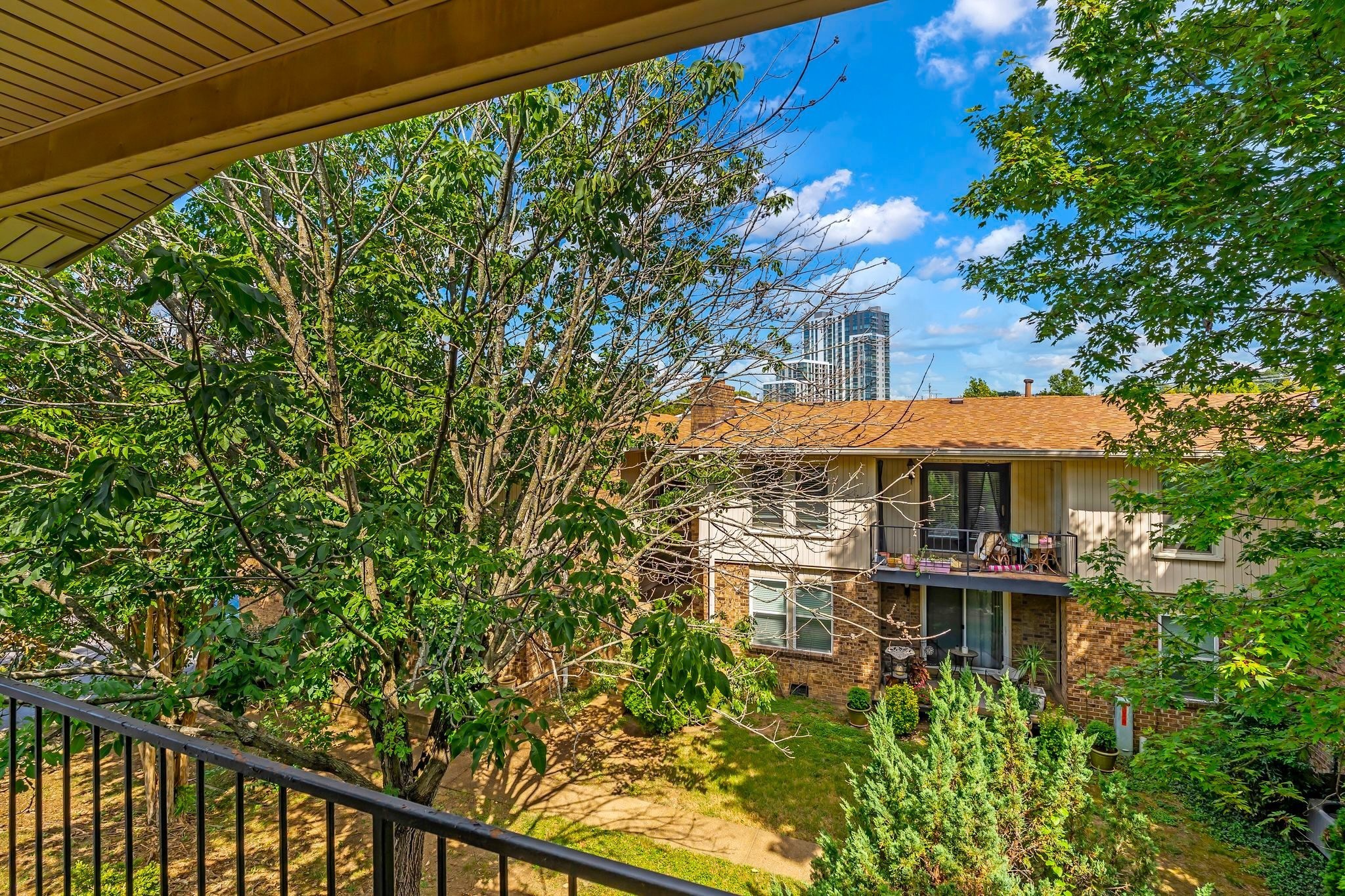 2116 Hobbs Road, Unit N19 Nashville, TN 37215 - Photo 29 of 33 a front view of a house with a yard