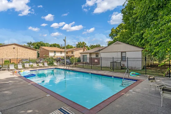 a view of a house with swimming pool