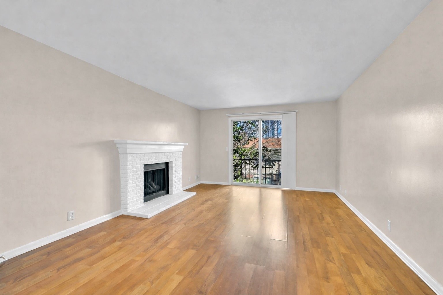 2116 Hobbs Road, Unit N19 Nashville, TN 37215 - Photo 9 of 33 a view of an empty room with a window and fireplace