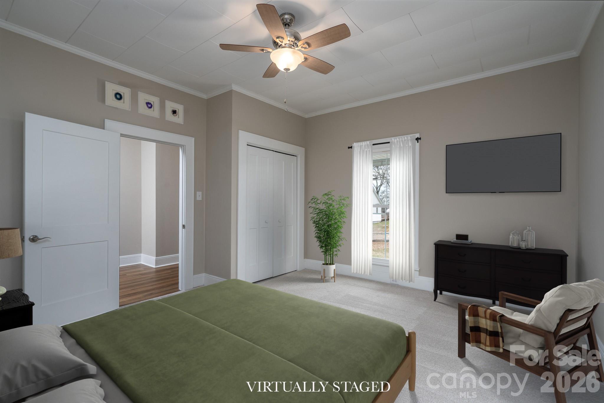 61 3rd Street Northwest Concord, NC 28027 - Photo 17 of 40 a bedroom with a bed and a window