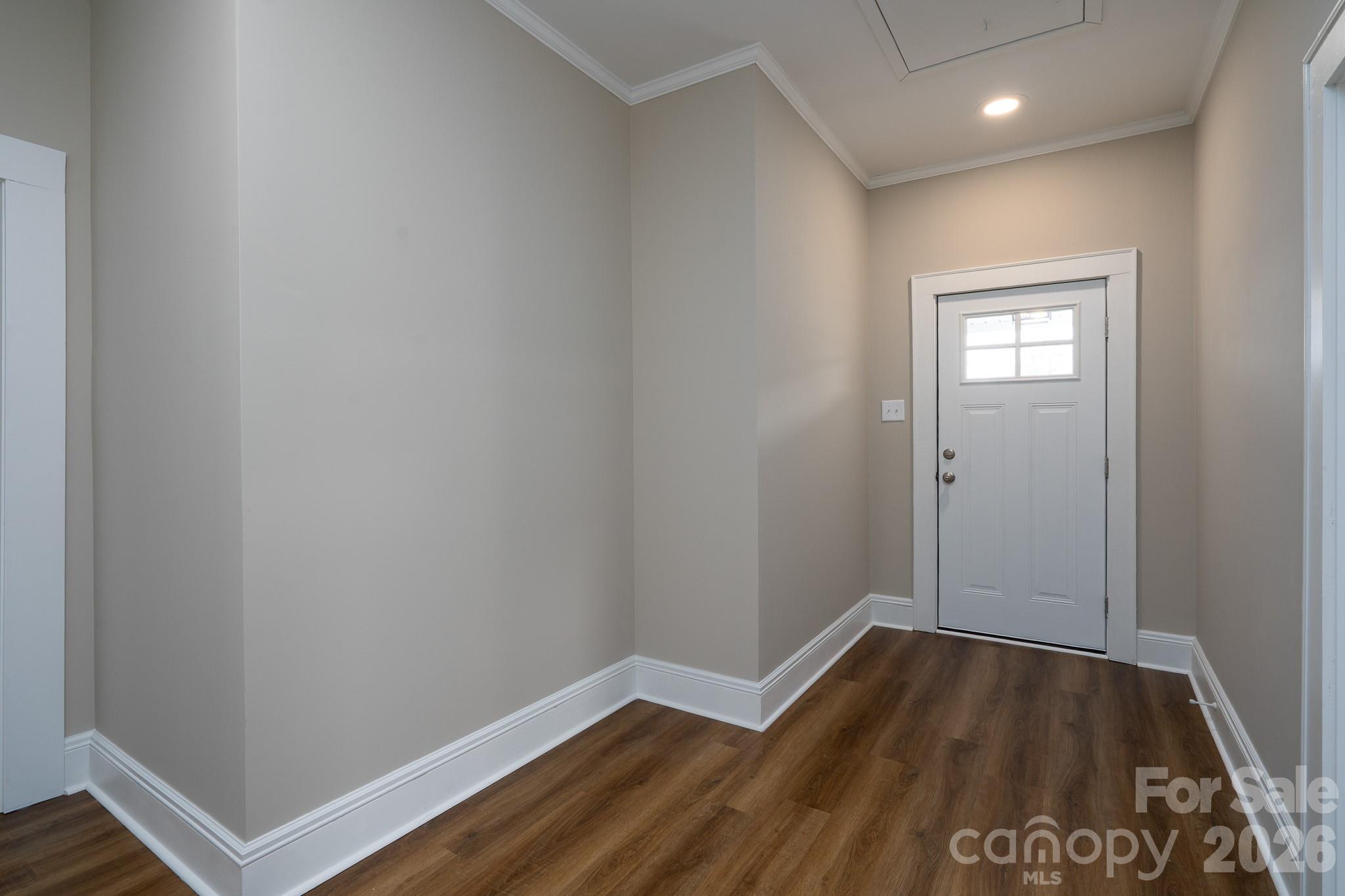 61 3rd Street Northwest Concord, NC 28027 - Photo 2 of 40 a view of hallway with wooden floor