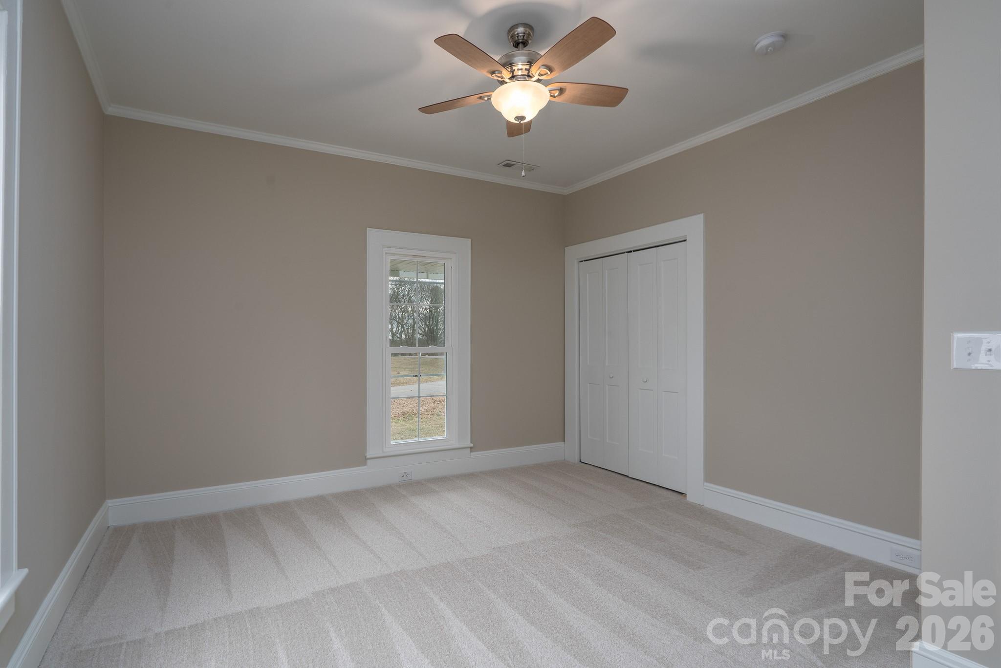 61 3rd Street Northwest Concord, NC 28027 - Photo 22 of 40 a view of an empty room with a window