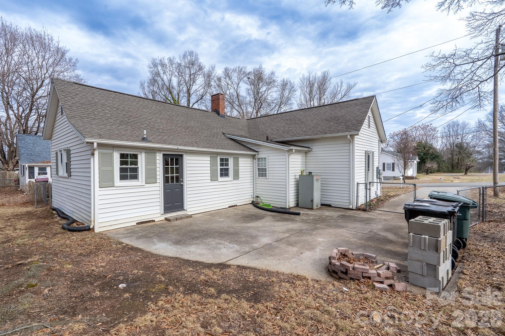 61 3rd Street Northwest Concord, NC 28027 - Photo 35 of 40 a view of a house with a patio
