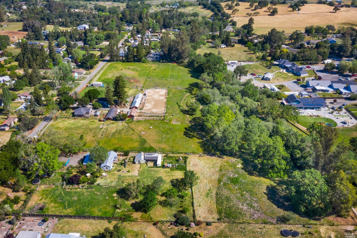 4581 Daywalt Road Sebastopol, CA 95472 - Photo 1 of 1 an aerial view of a house with a yard swimming pool and outdoor seating