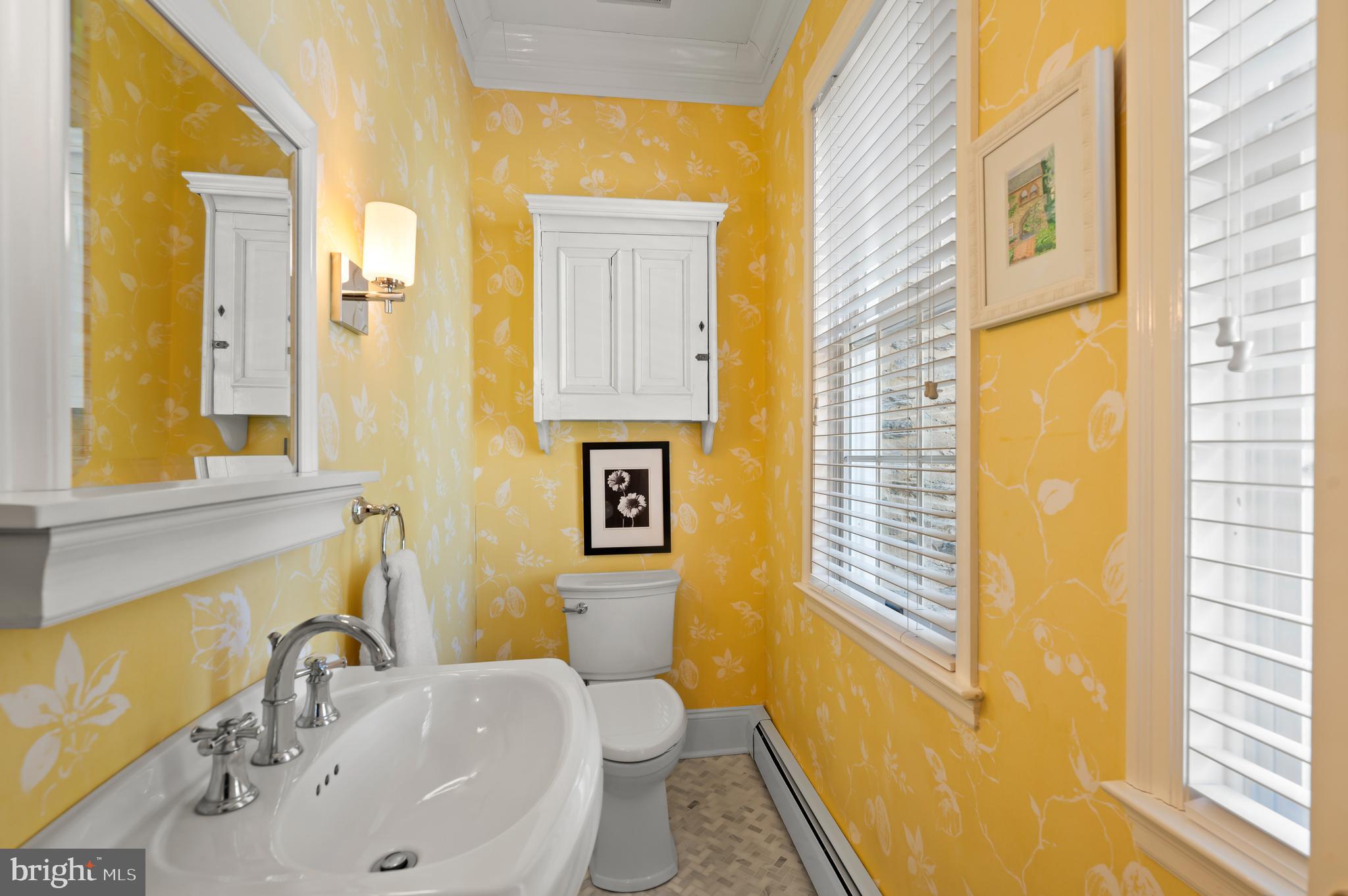 603 Foxfields Road Bryn Mawr, PA 19010 - Photo 14 of 51 a bathroom with a sink and a large mirror