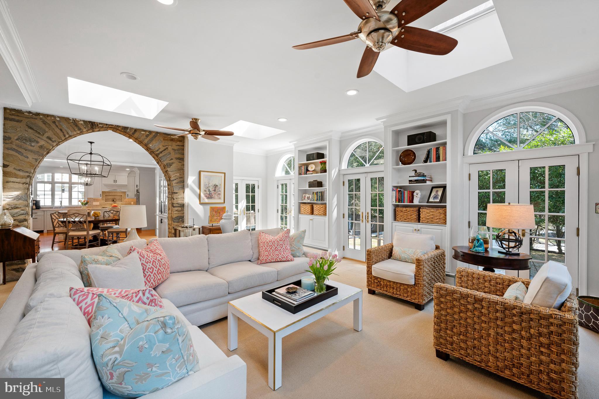 603 Foxfields Road Bryn Mawr, PA 19010 - Photo 21 of 51 a living room with furniture a large window and a chandelier