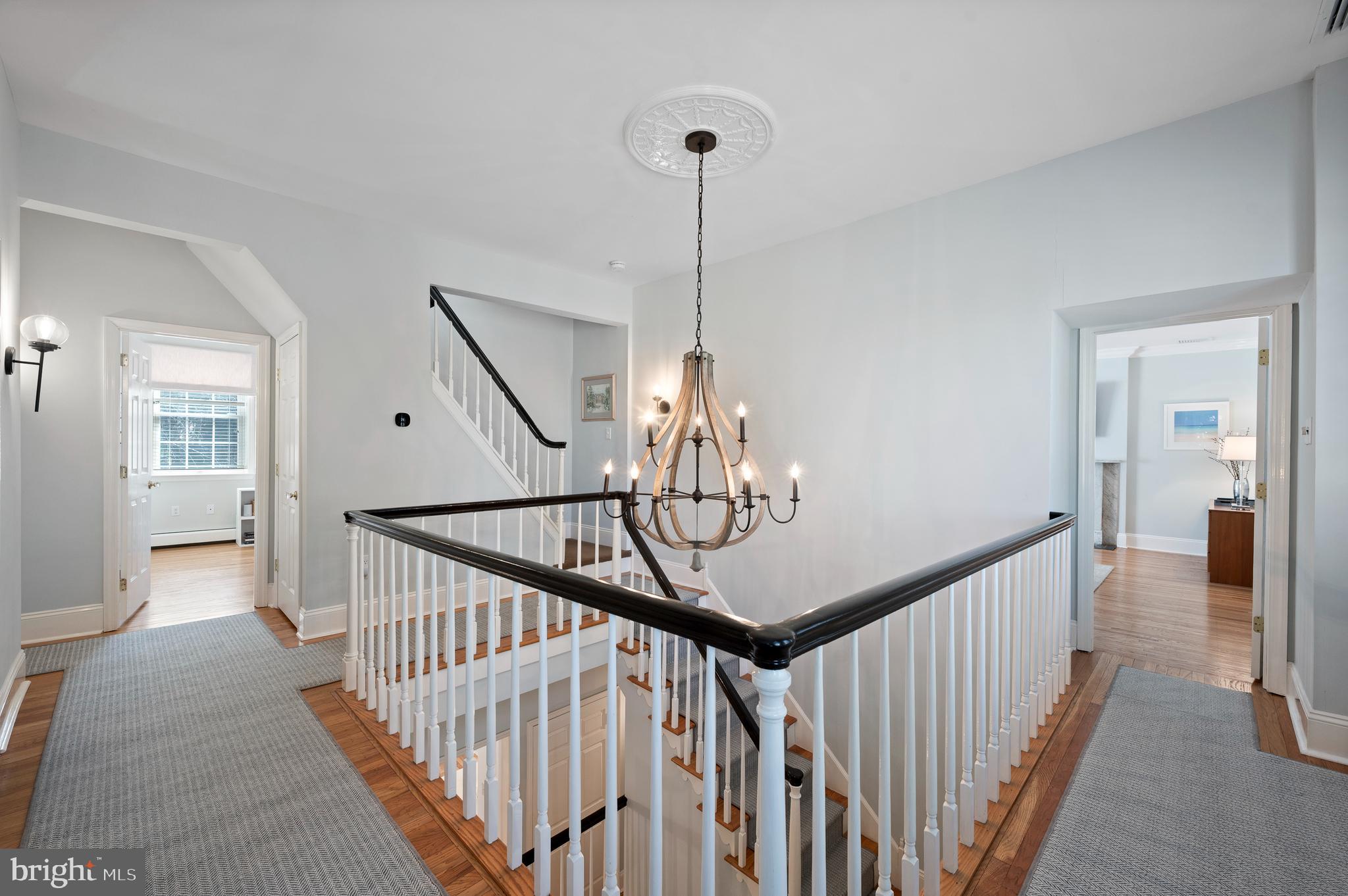 603 Foxfields Road Bryn Mawr, PA 19010 - Photo 26 of 51 a view of a hallway with wooden floor and stairs