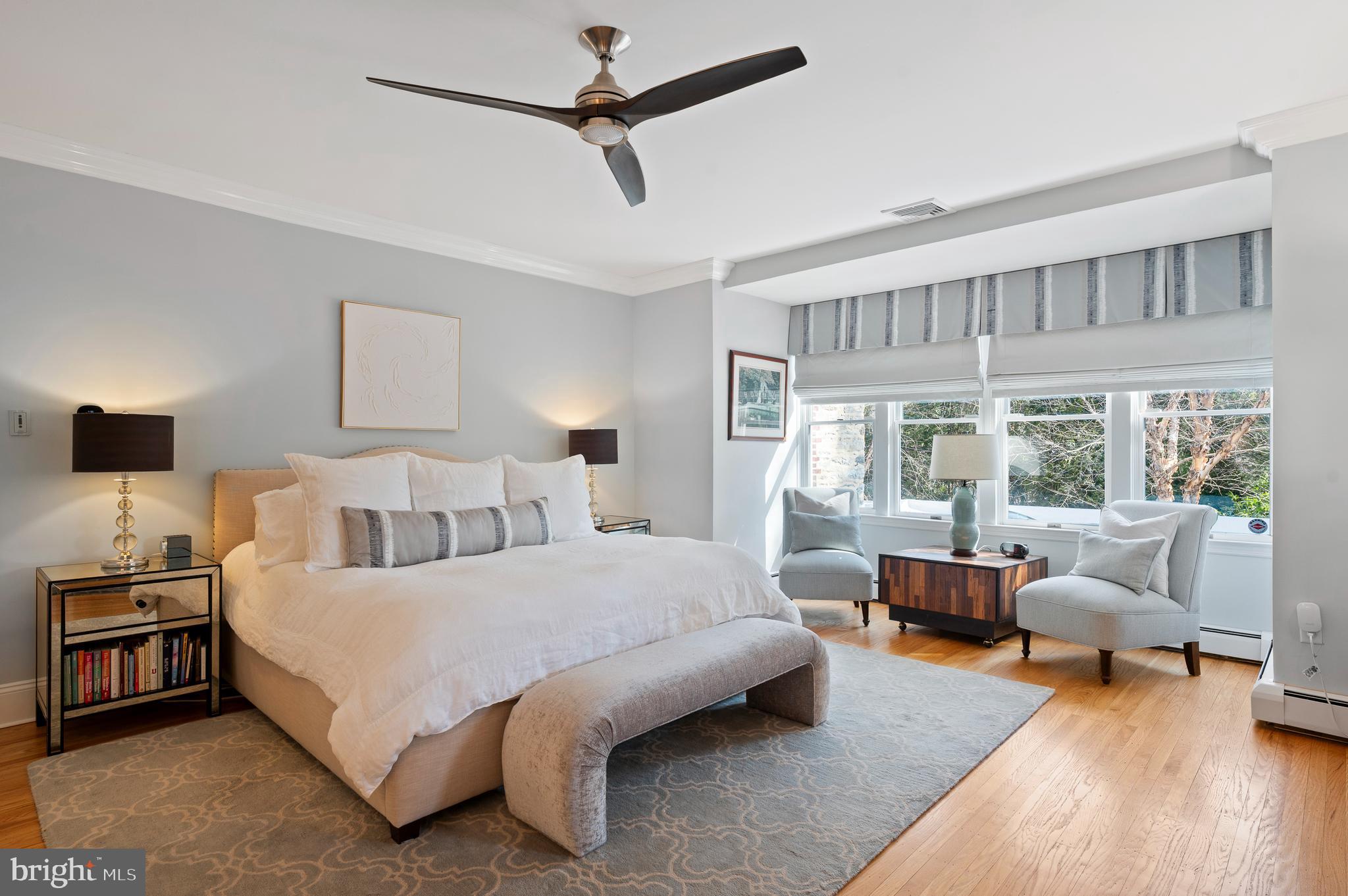 603 Foxfields Road Bryn Mawr, PA 19010 - Photo 28 of 51 a bedroom with a bed a couch and a large window