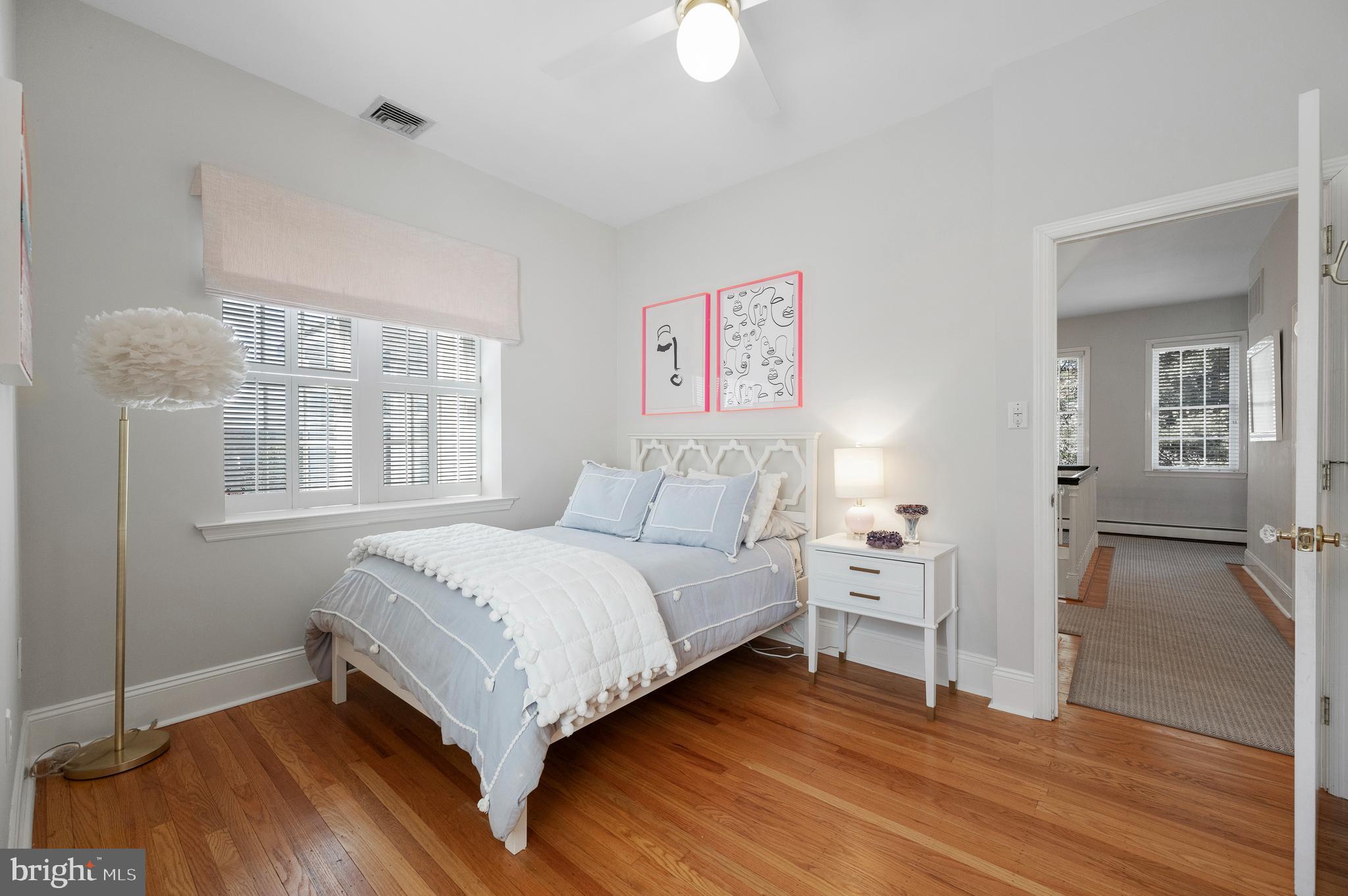 603 Foxfields Road Bryn Mawr, PA 19010 - Photo 33 of 51 a bedroom with a bed and a large window