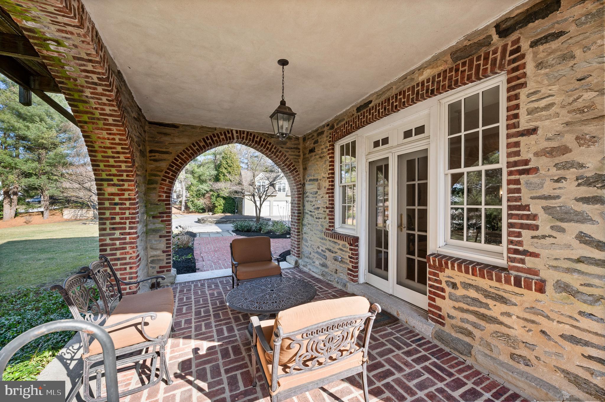 603 Foxfields Road Bryn Mawr, PA 19010 - Photo 45 of 51 a view of a chairs and table in a porch
