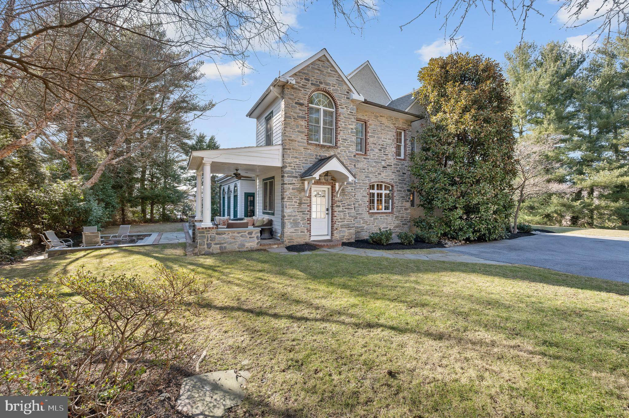 603 Foxfields Road Bryn Mawr, PA 19010 - Photo 5 of 51 a front view of a house with a yard