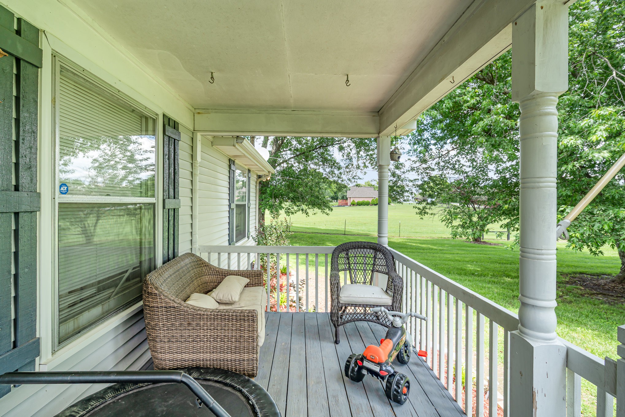 905 Nokes Road Lebanon, TN 37090 - Photo 3 of 30 a view of a chair and tables in the balcony