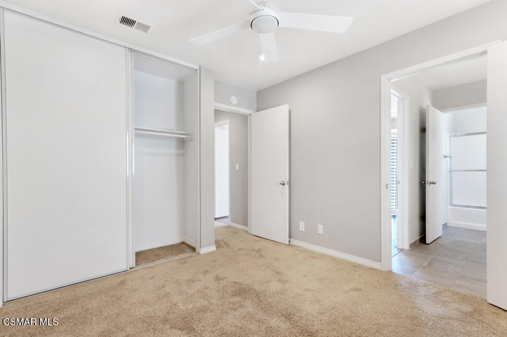 1980 Rory Lane, Unit 3 Simi Valley, CA 93063 - Photo 17 of 33 a view of an empty room with a ceiling fan