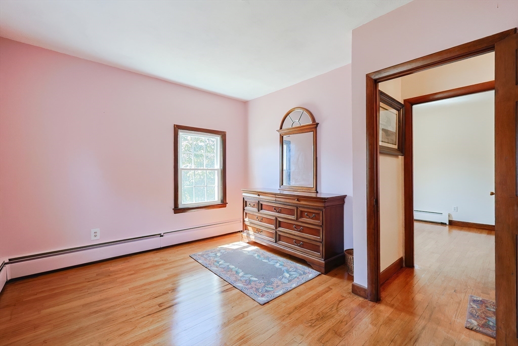 64 Smith Street North Attleboro, MA 02760 - Photo 18 of 42 a view of room with window and wooden floor