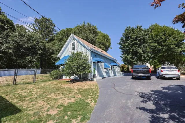 a car parked in front of a house