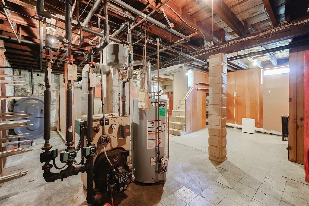 64 Smith Street North Attleboro, MA 02760 - Photo 23 of 42 a view of a room with gym equipment