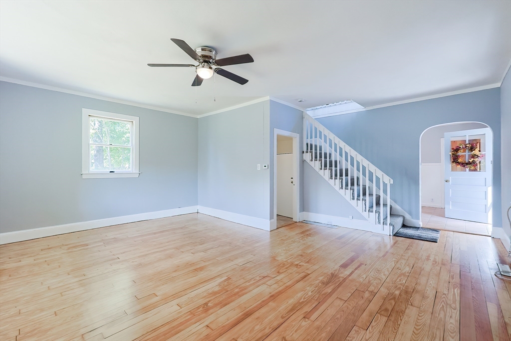 64 Smith Street North Attleboro, MA 02760 - Photo 28 of 42 a view of an empty room with wooden floor and a window