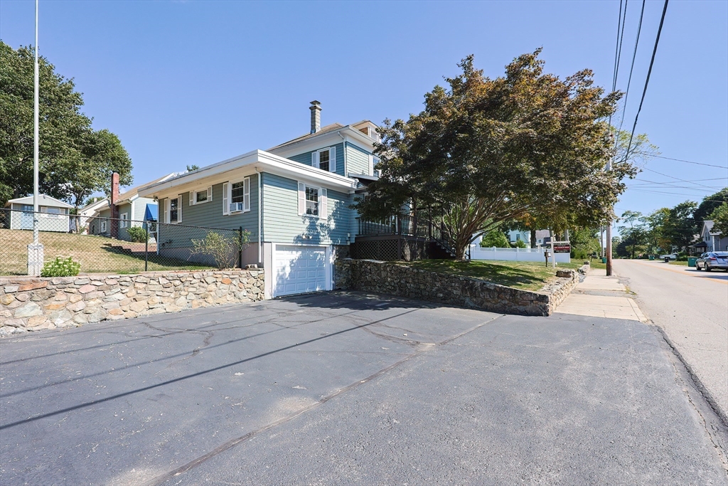 64 Smith Street North Attleboro, MA 02760 - Photo 39 of 42 a view of a house with a yard and large tree