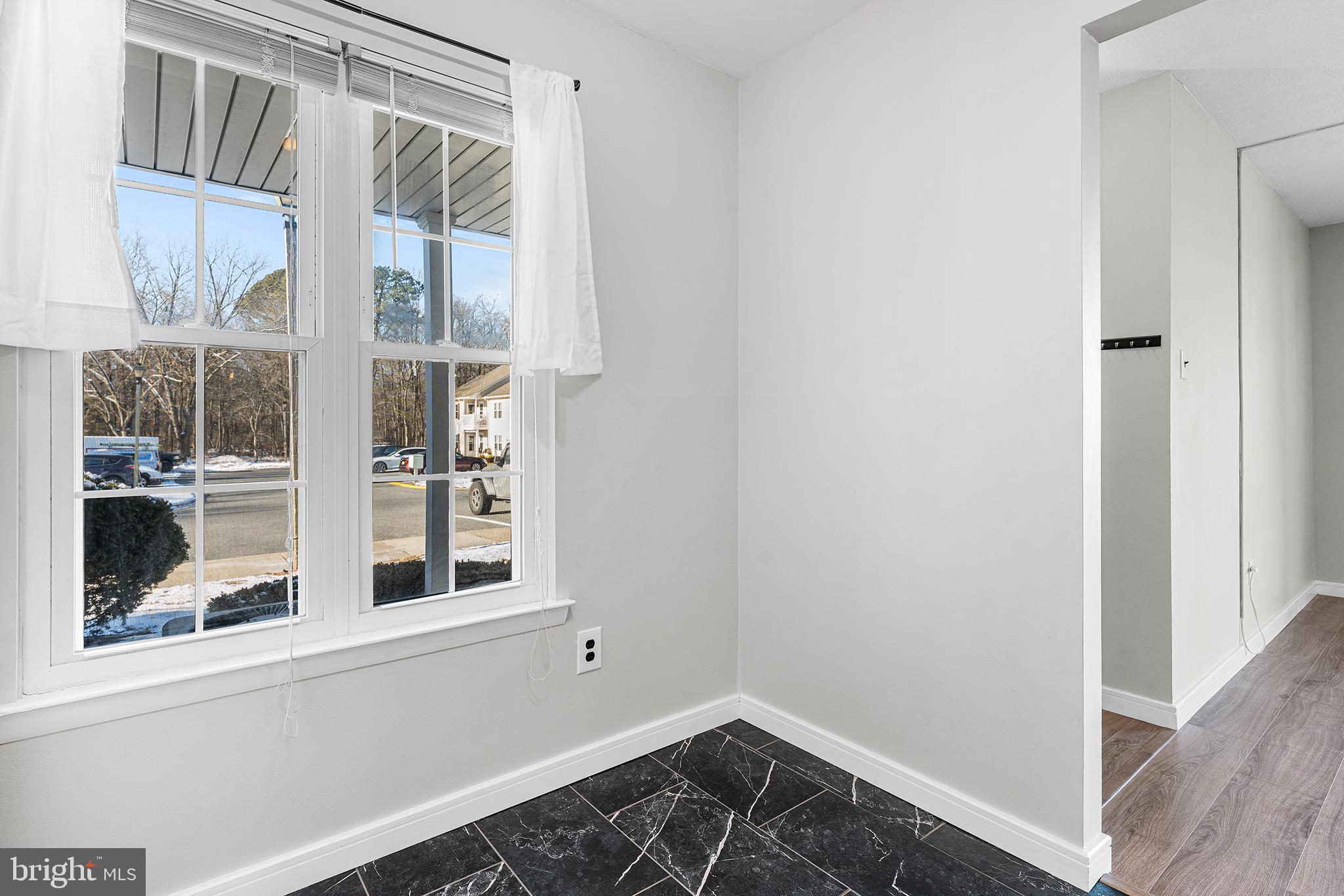 701 Sedgewick Court, Unit 701 Sewell, NJ 08080 - Photo 18 of 31 a view of empty room with windows