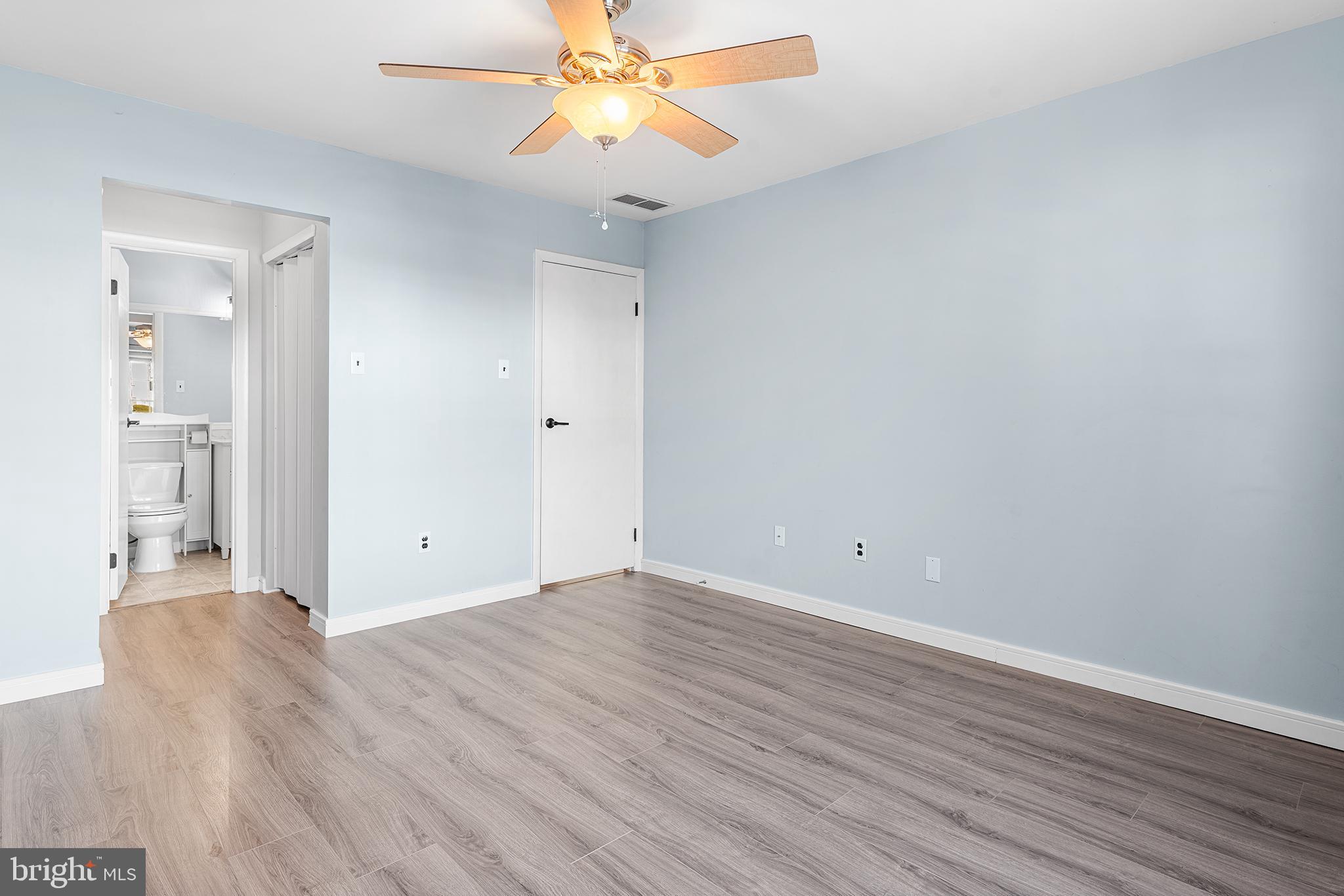701 Sedgewick Court, Unit 701 Sewell, NJ 08080 - Photo 21 of 31 wooden floor in an empty room