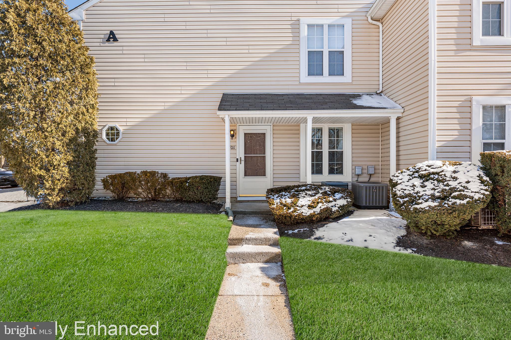 701 Sedgewick Court, Unit 701 Sewell, NJ 08080 - Photo 3 of 31 a front view of a house with garden