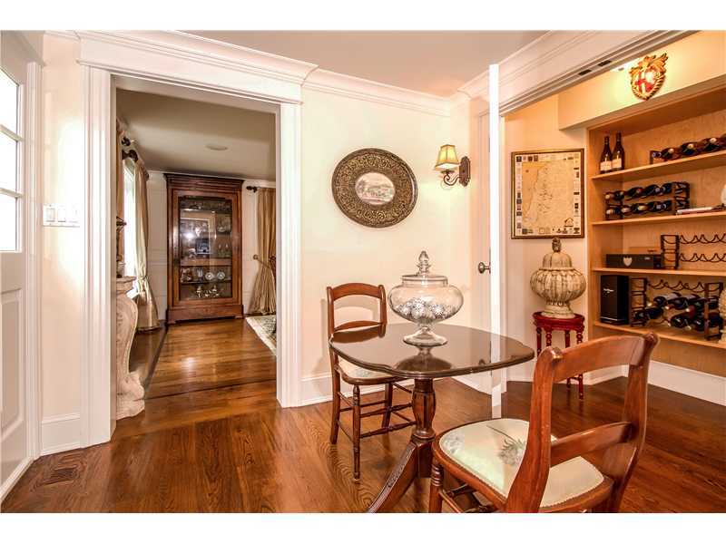 2 Bishops Gate Road Darien, CT 06820 - Photo 12 of 25 a dining room with furniture and wooden floor