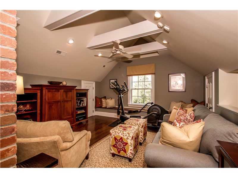 2 Bishops Gate Road Darien, CT 06820 - Photo 19 of 25 a living room with furniture a chandelier