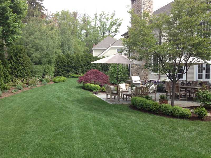 2 Bishops Gate Road Darien, CT 06820 - Photo 20 of 25 a view of a chair and table of the garden