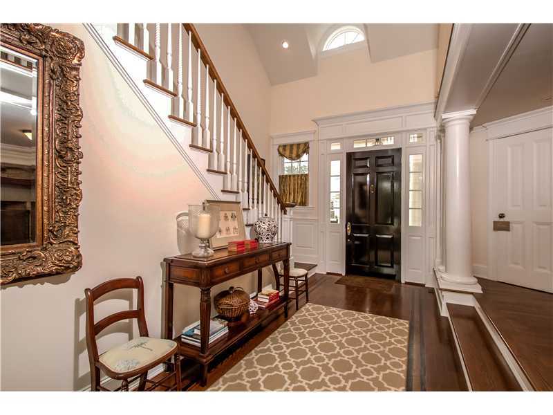 2 Bishops Gate Road Darien, CT 06820 - Photo 3 of 25 a view of entryway and hall with wooden floor