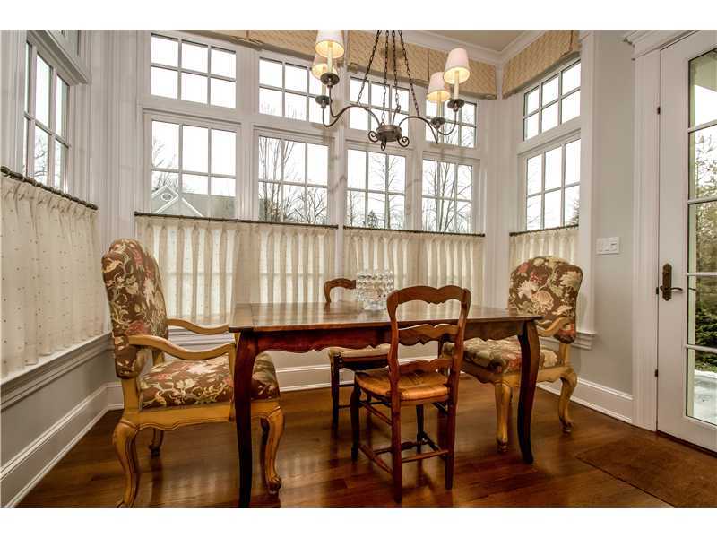 2 Bishops Gate Road Darien, CT 06820 - Photo 10 of 25 a view of a dining room with furniture and chandelier