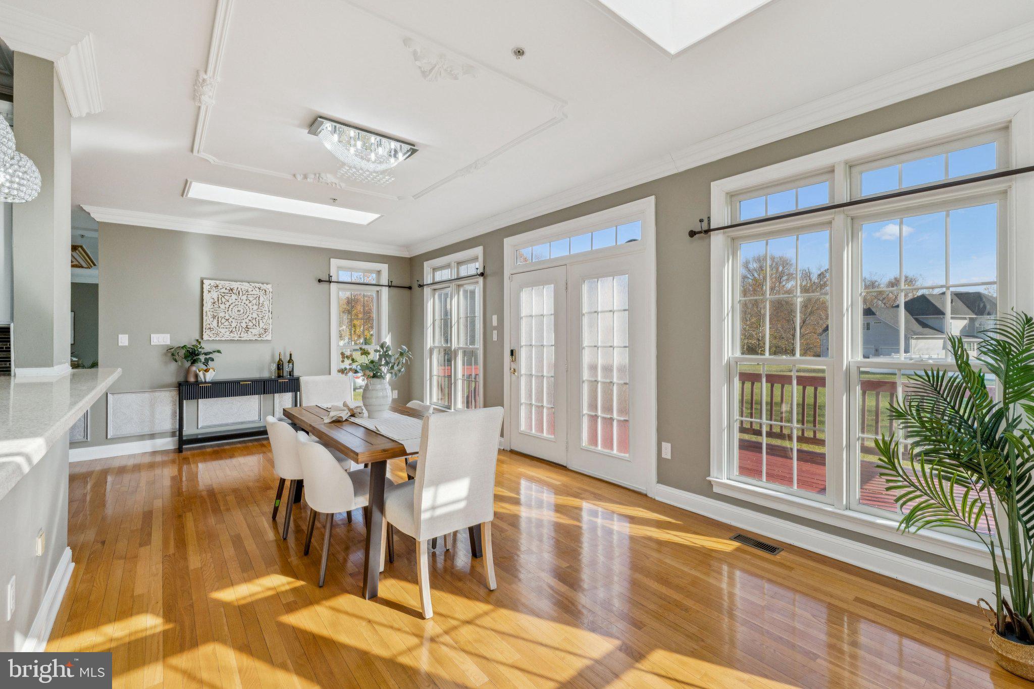 2205 Dhow Court Bowie, MD 20721 - Photo 12 of 40 a living room with furniture and a large window