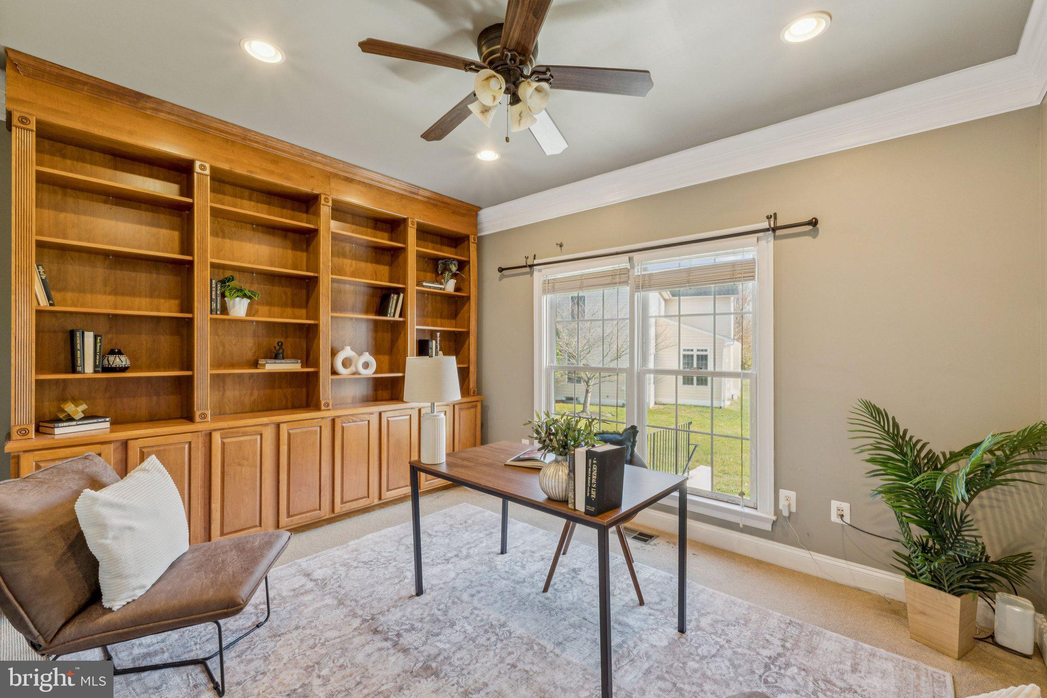 2205 Dhow Court Bowie, MD 20721 - Photo 14 of 40 a workspace with furniture and a potted plant