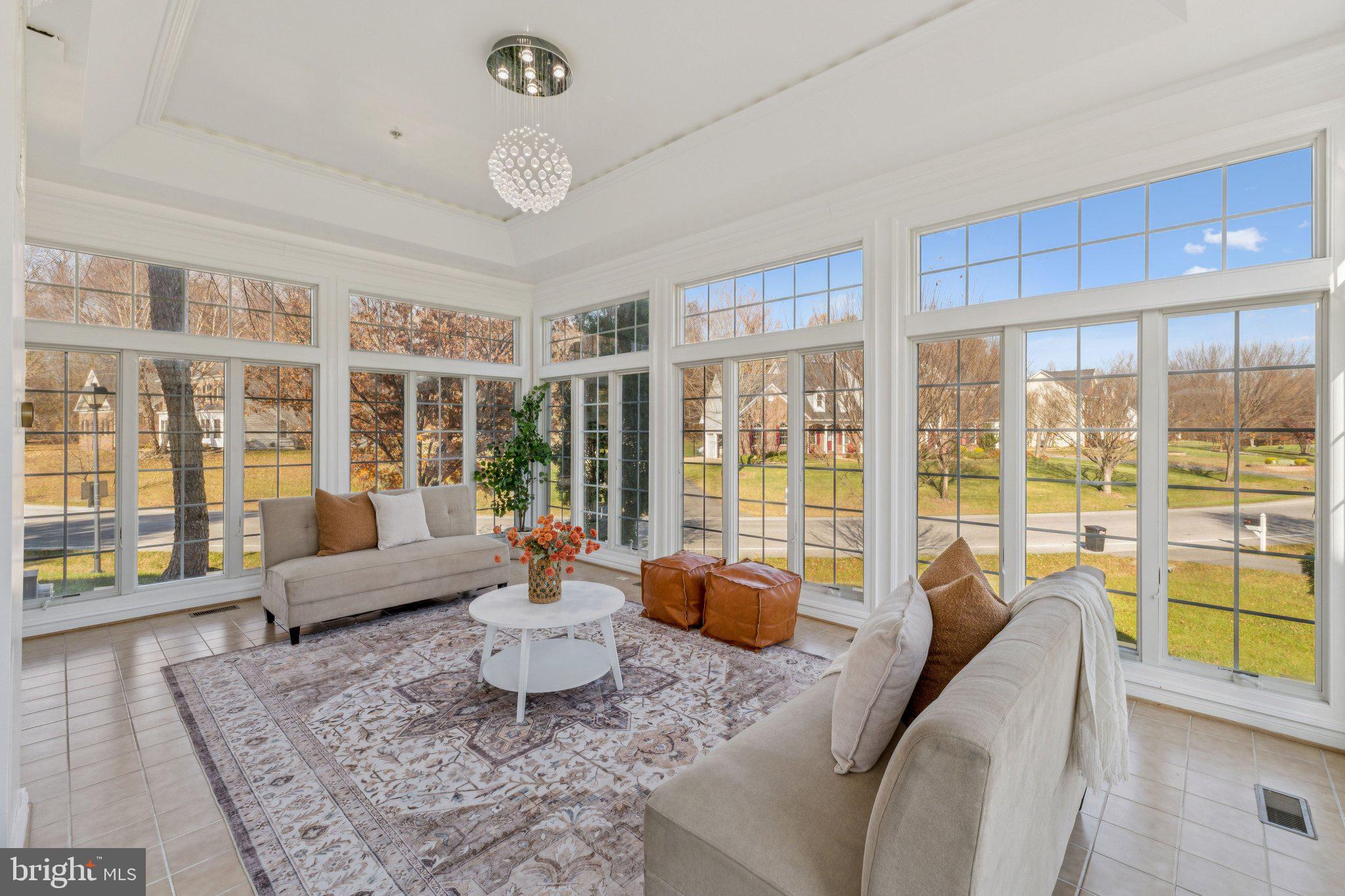 2205 Dhow Court Bowie, MD 20721 - Photo 16 of 40 a living room with furniture and large windows